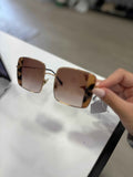 Gafas de sol Miu Miu Oversize: Un Estilo Vintage que Transforma Tu Look